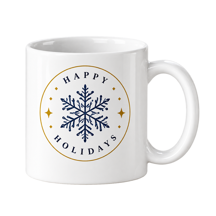 White mug with a navy snowflake inside a gold circle and the words Happy Holidays around it.